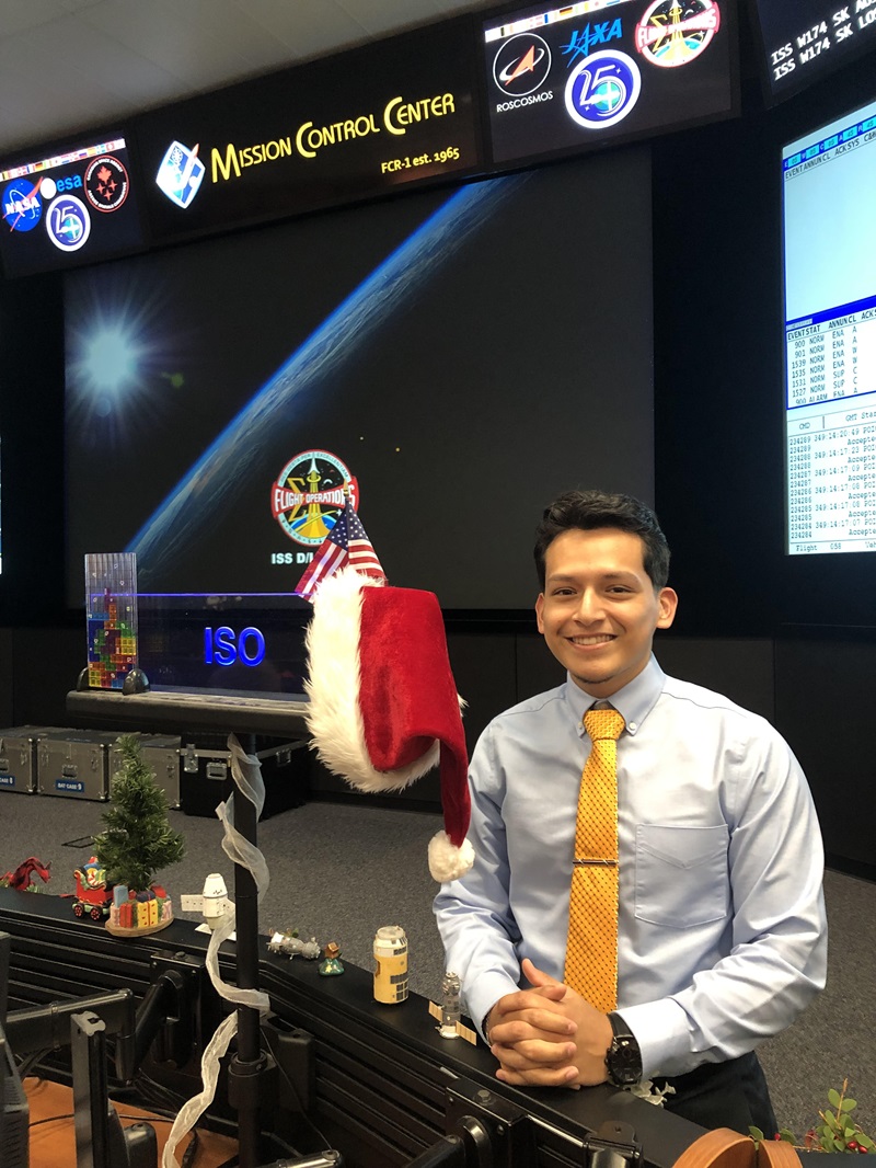 Ricky Gonzalez '21 in the mission control center of Johnson Space Center